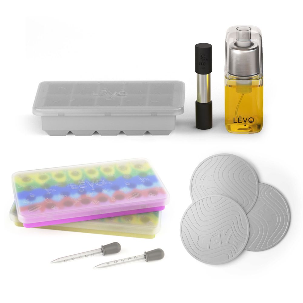 The LĒVO Basics Accessories Kit with silicone trivets, herb block tray, herb press, gummy mold set of 2, and infusion sprayer